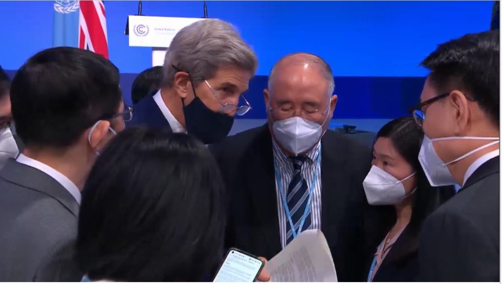 Last minute negotiations between John Kerry (U.S.) and Xie Zhenhua (China), Special Envoys for Climate
